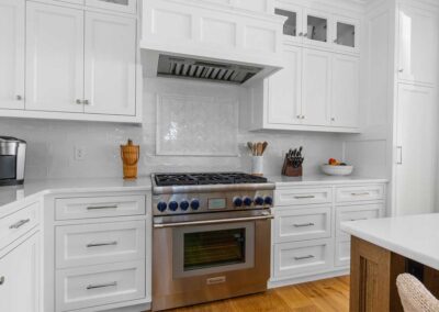 stove and oven in clean white kitchen