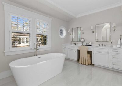 Bathroom with large stand-alone tub and vanity