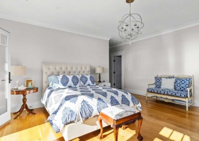 Bedroom with beautiful blue and white bedspread