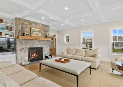 White sofas and working fireplace in Chatham, MA