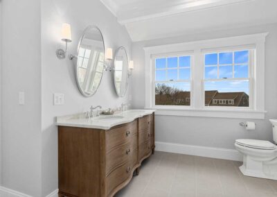dark wood vanity with double sinks